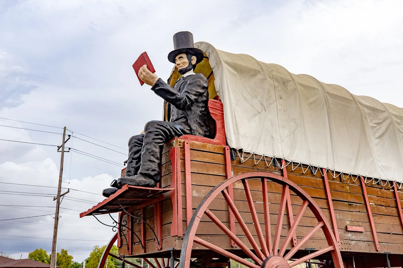 Giant Abraham Lincoln statue on the World's Largest Covered Wagon in Lincoln, Illinois Route 66 roadside attraction