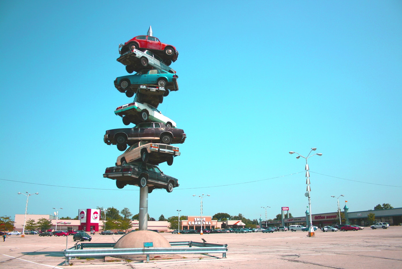 The Spindle in Berwyn, Illinois. Also known as cars on a spike or the car kabob.  This roadside attraction was torn down in 2008.