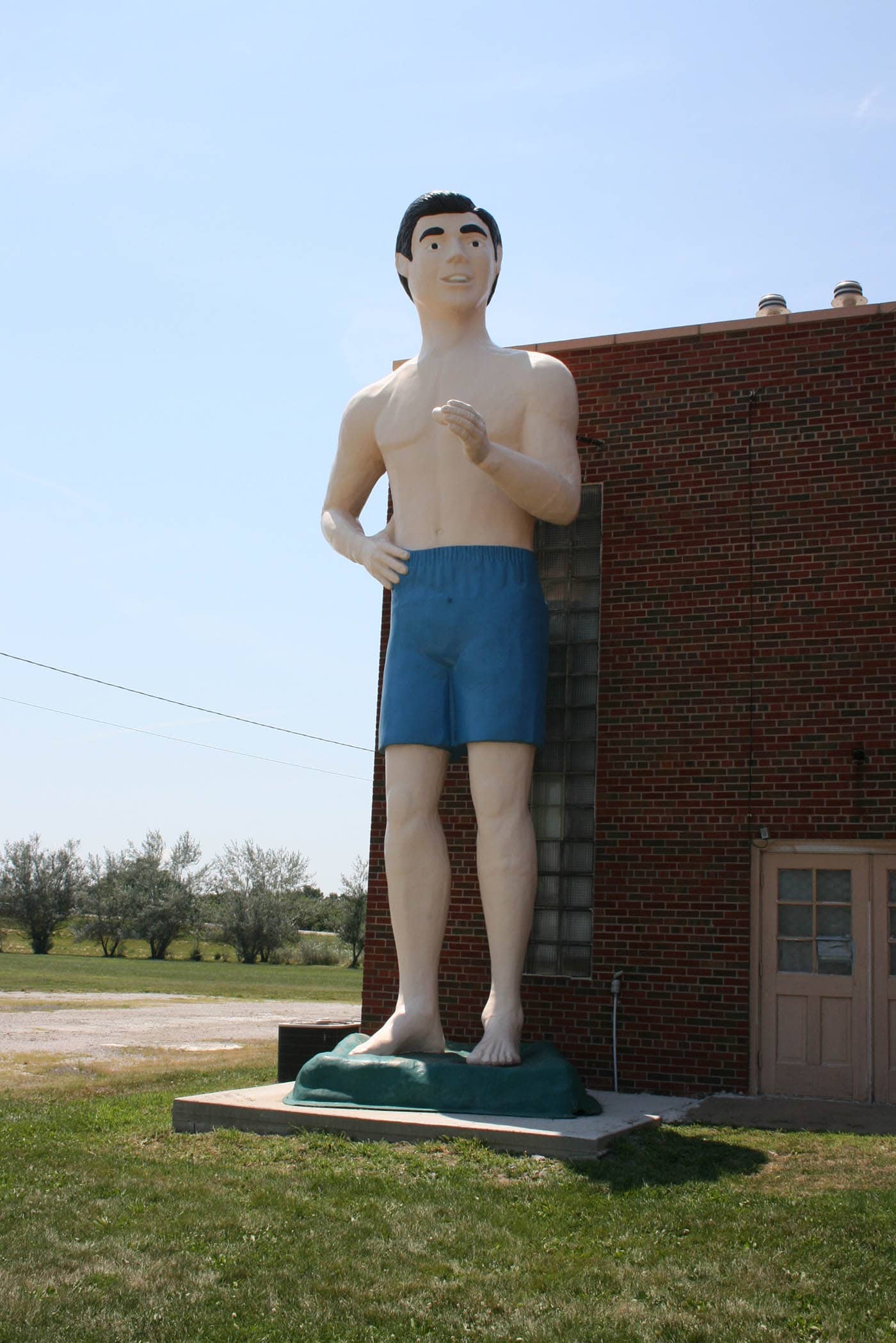 Giant Beach Guy - a roadside attraction at Pink Elephant Antique Mall in Livingston, Illinois