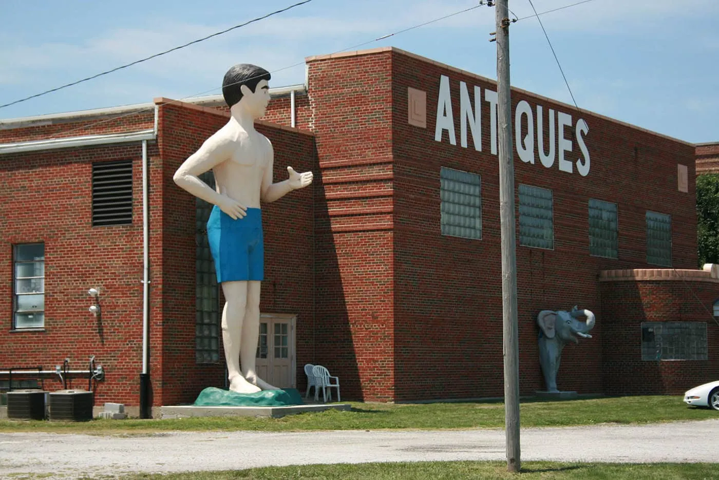 Giant Beach Guy - a roadside attraction at Pink Elephant Antique Mall in Livingston, Illinois