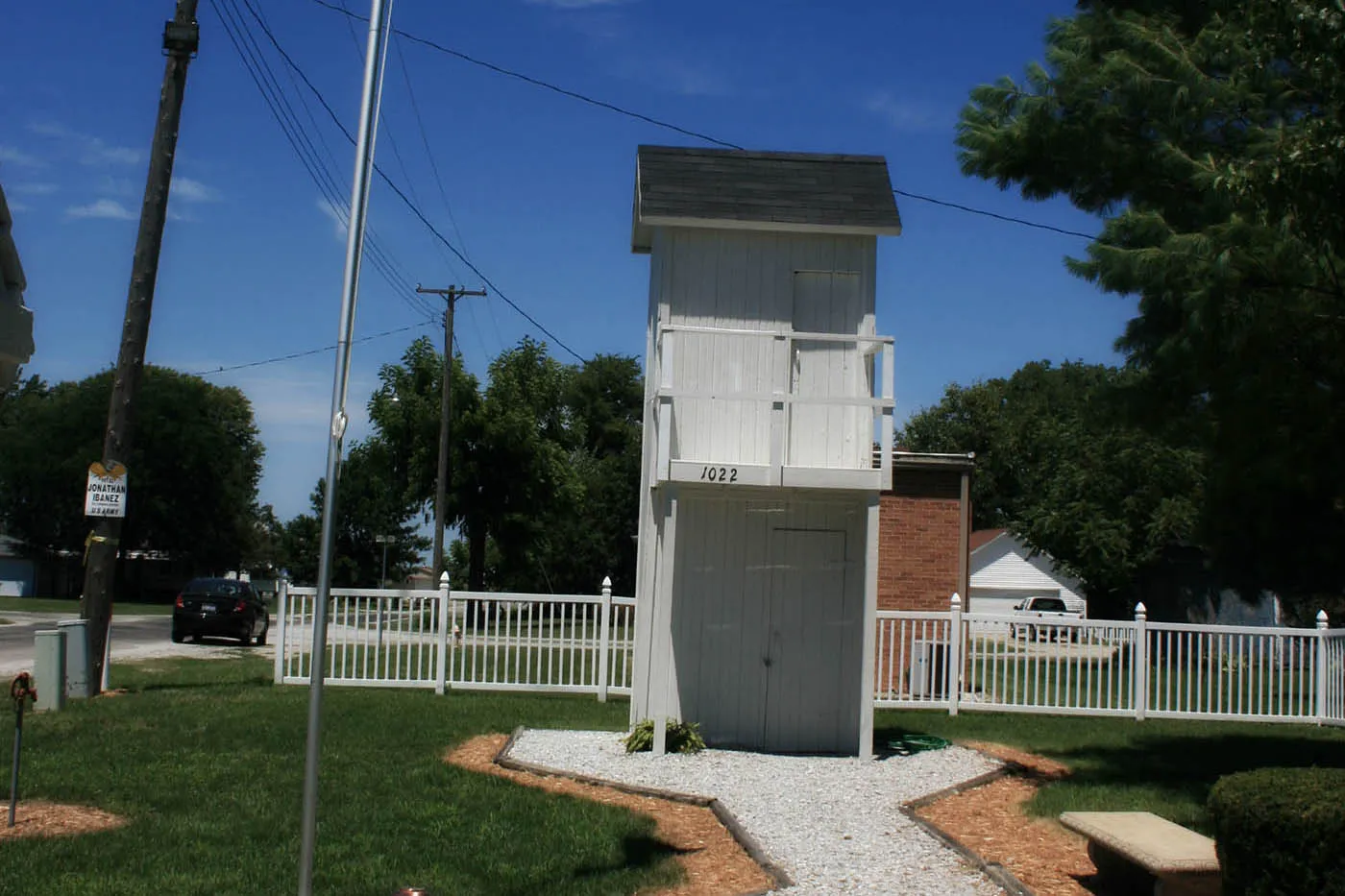 Best Illinois roadside attractions: Two-Story Outhouse in Gays, Illinois. Visit this roadside attraction on an Illinois road trip with kids or weekend getaway with friends. Add the Two Story Outhouse to your road trip bucket list and visit them on your next travel adventure.