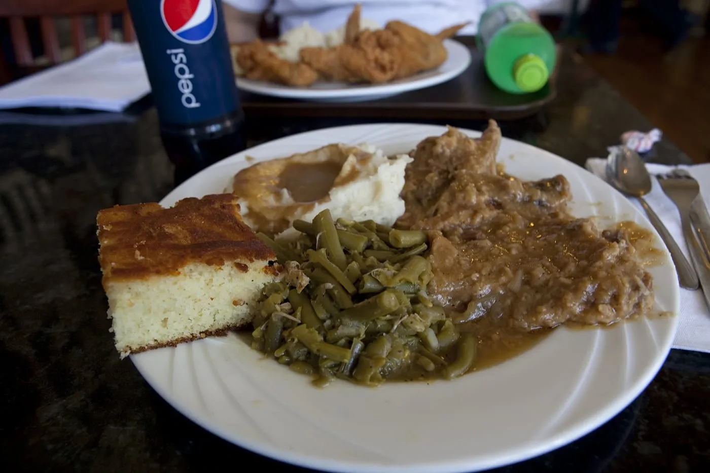Smothered pork and mashed potatoes at Sweetie Pie's in St. Louis, Missouri.