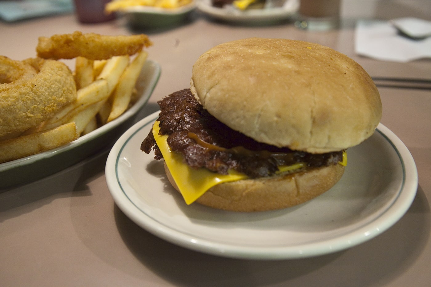 Double hamburger with cheese and a 50/50 of fries and onion rings at Winstead's in Overland Park, Kansas