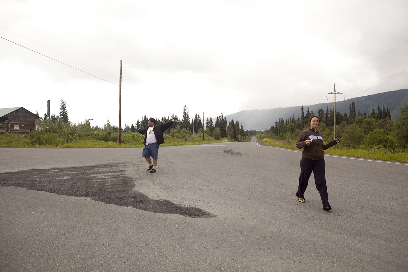 Playing in the middle of the highway at the Meziadin Junction, a Hyder, Alaska Visitor Information Center, in British Columbia, Canada.