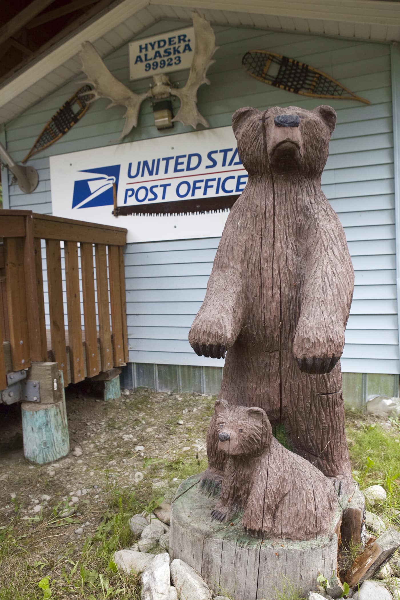 Wooden carved bear and cub at the Hyder, Alaska Post Office.