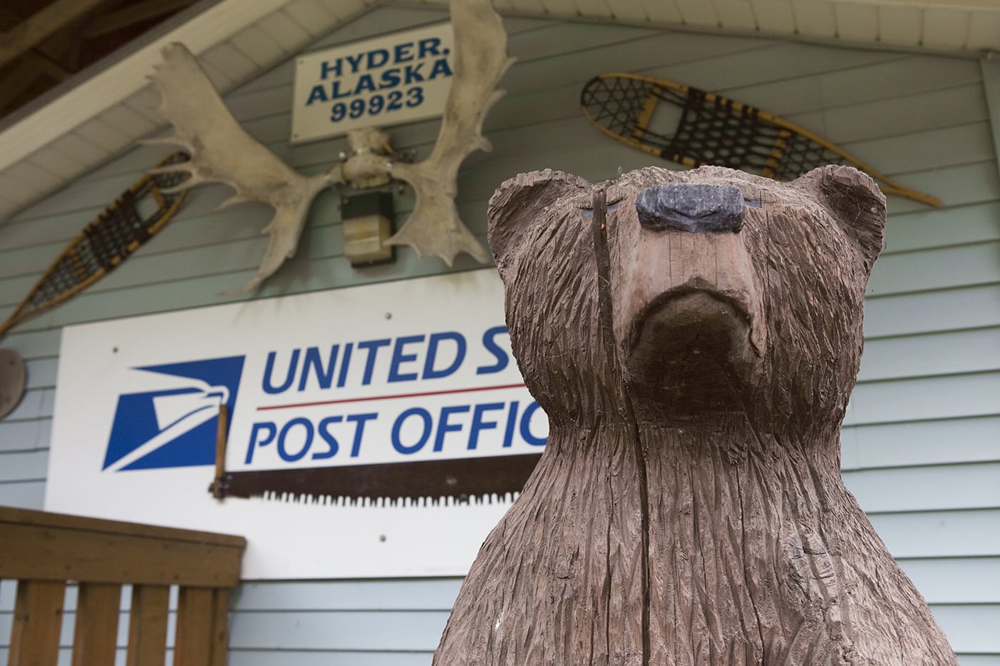 Wooden carved bear and cub at the Hyder, Alaska Post Office.