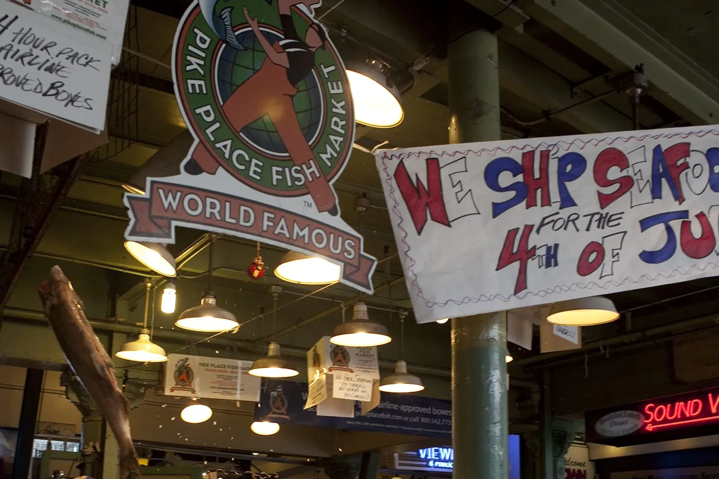Fishmongers throwing fish at Pike Place Fish Market in Seattle, Washington.
