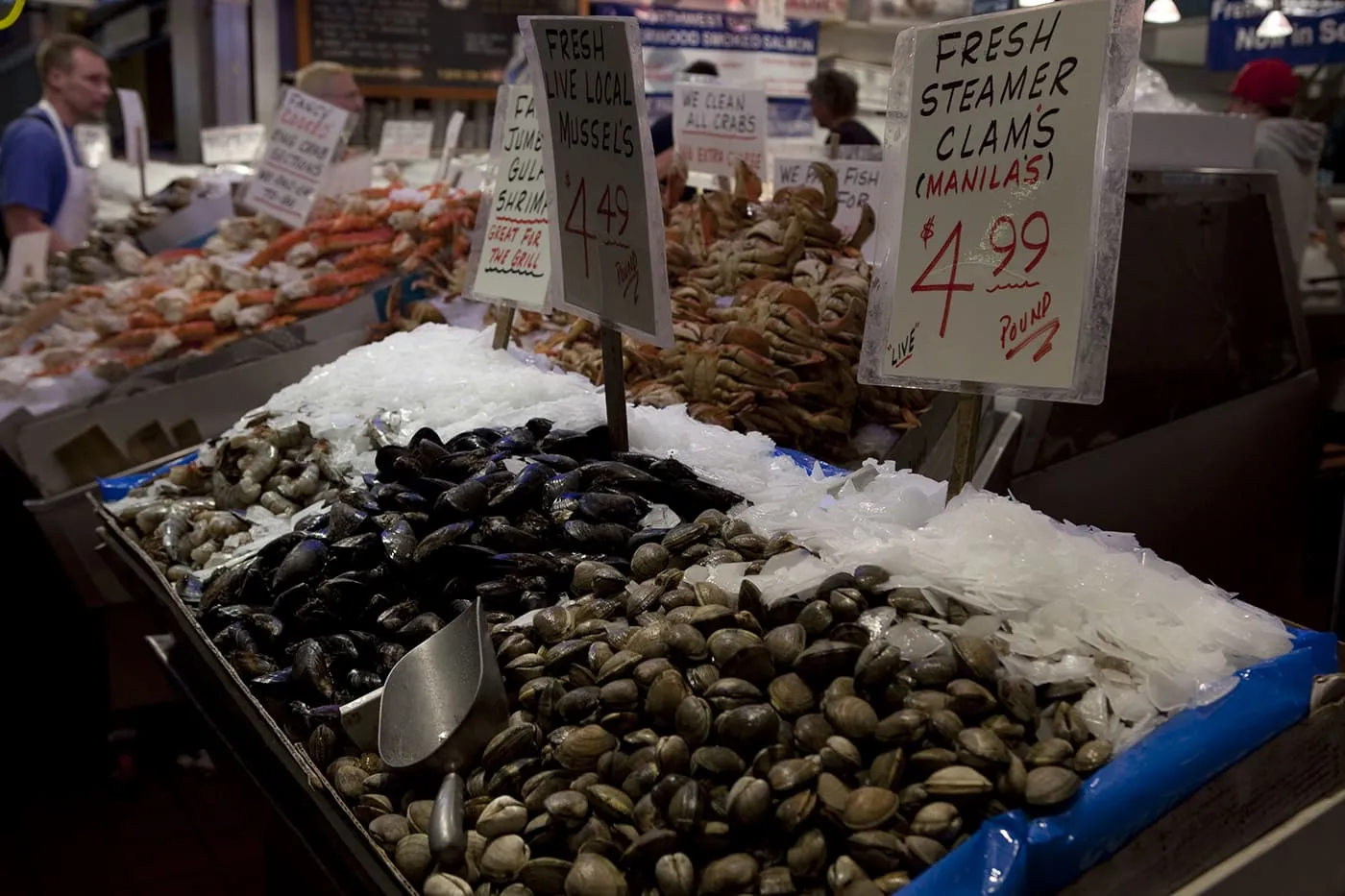 Clams and mussels for sale at Pike Place Market in Seattle, Washington.