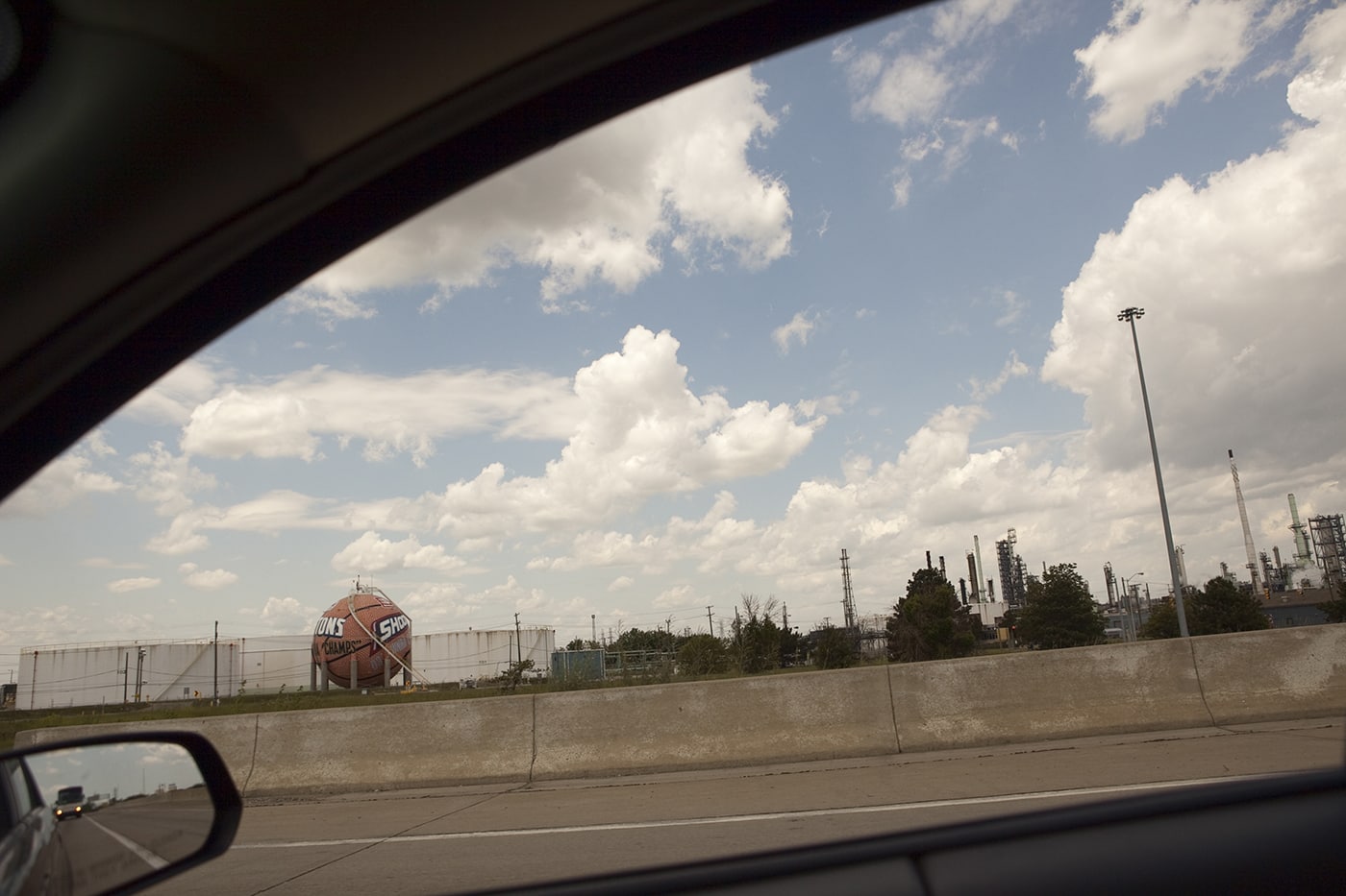 Giant basketball painted with the Detroit Pistons and WNBA Detroit Shock team logos, outside of Detroit, Michigan.