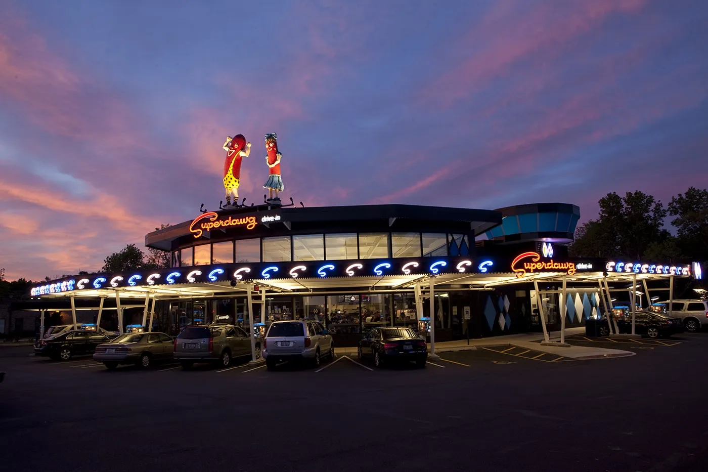 New giant hot dogs on the roof of Superdawg Wheeling.