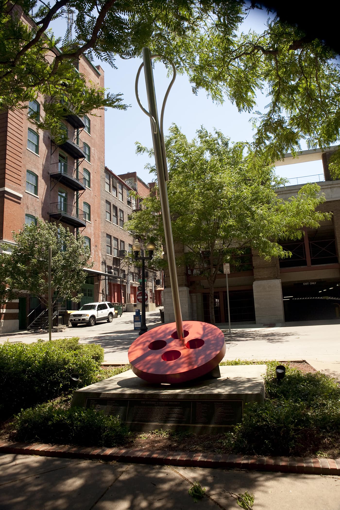 Giant needle threading a button in Kansas City, Missouri