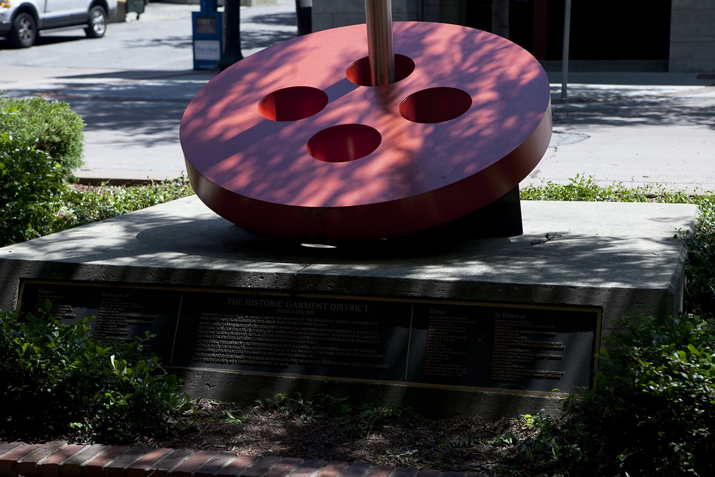 Giant needle threading a button in Kansas City, Missouri