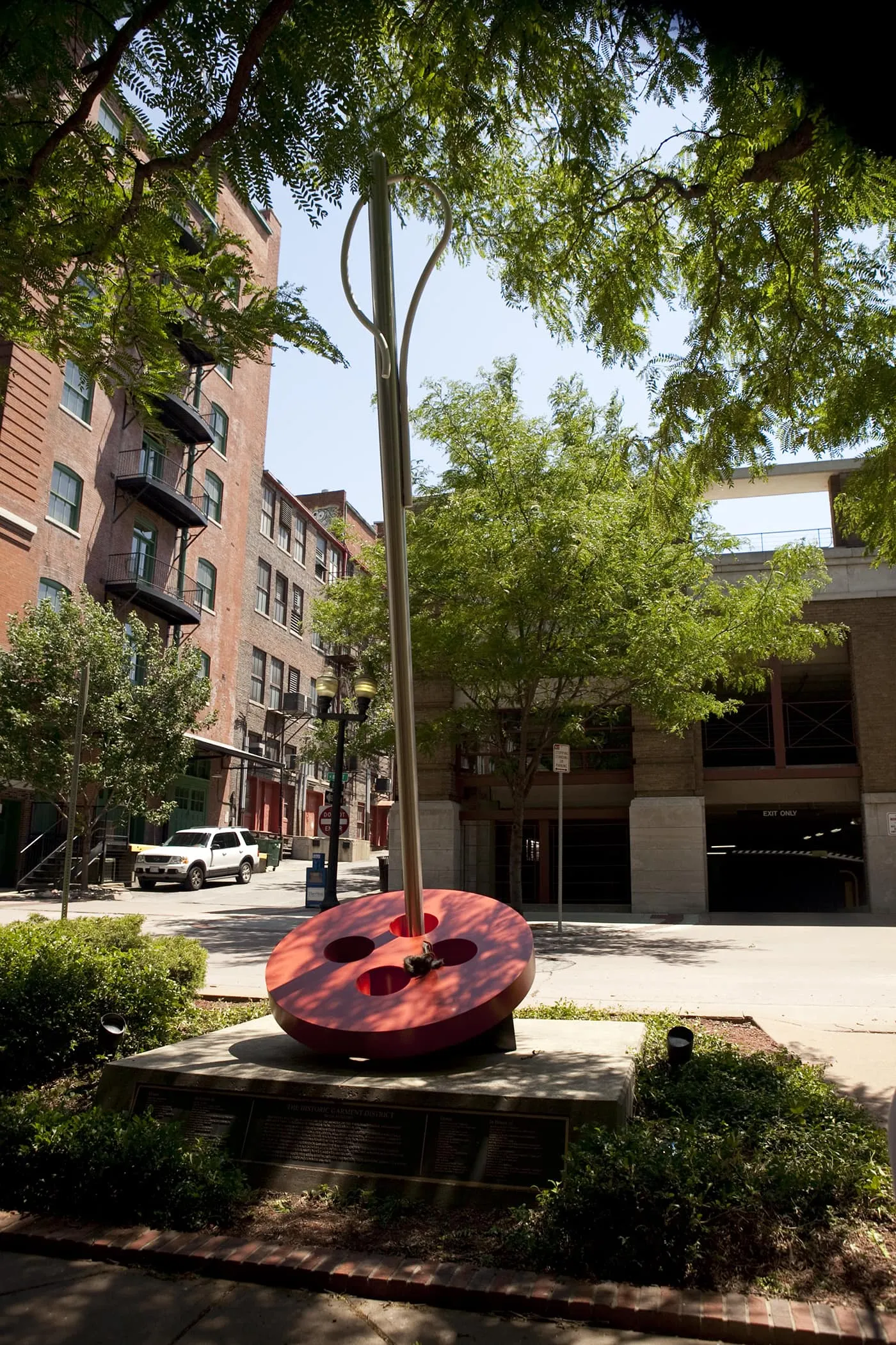 Giant needle threading a button in Kansas City, Missouri