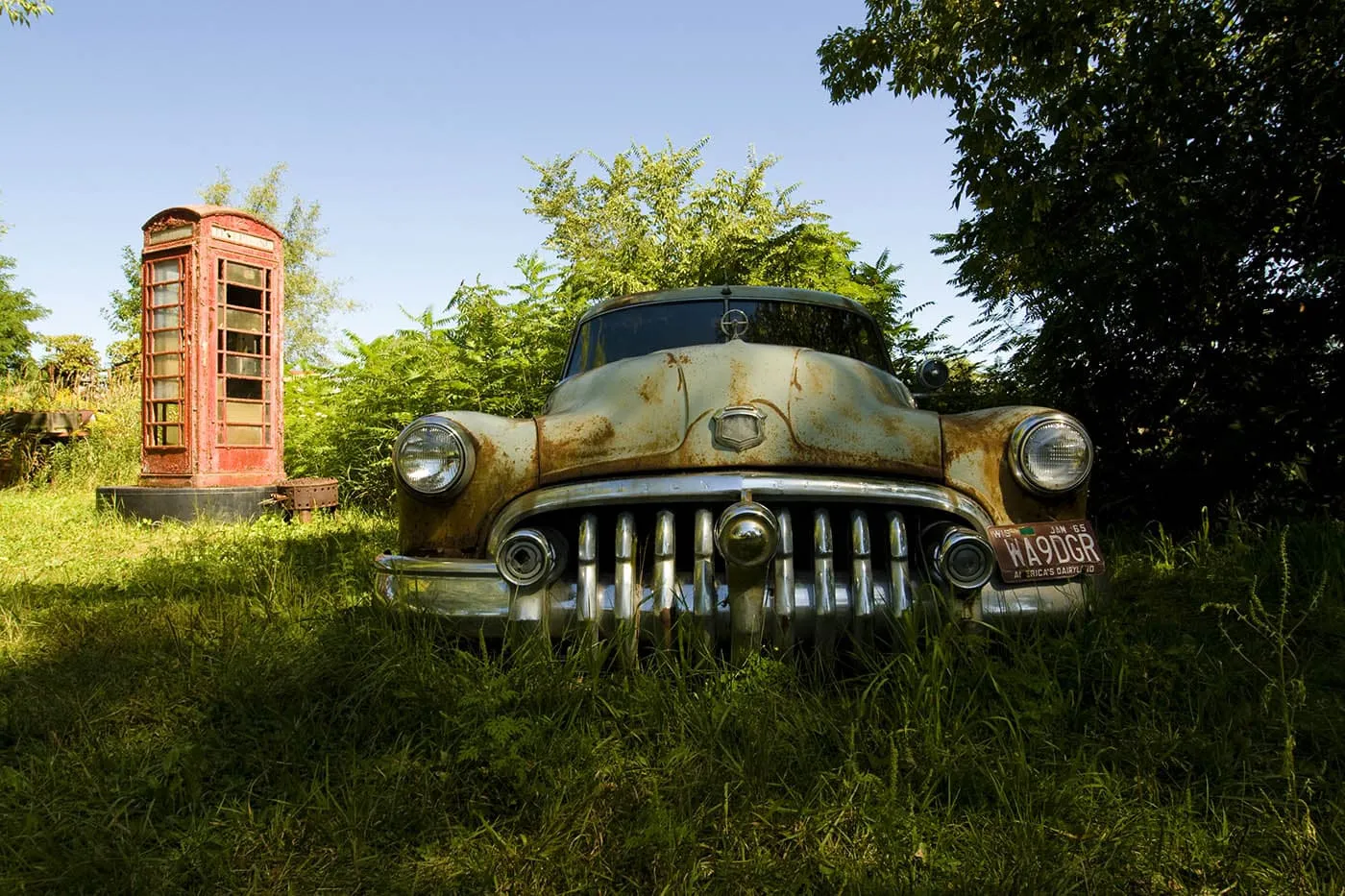 Old cars. The world's largest scrap metal sculpture, Dr. Evermor's Forevertron at Delaney's Surplus Sales in Sumpter, Wisconsin, is meant for intergalactic travel. Visit this weird roadside attraction on a Wisconsin road trip.