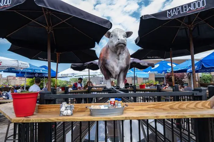 Gene's Sausage Shop rooftop cow. Giant cow statue in Lincoln Square, Chicago, Illinois.