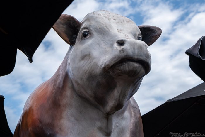 Gene's Sausage Shop rooftop cow. Giant cow statue in Lincoln Square, Chicago, Illinois.