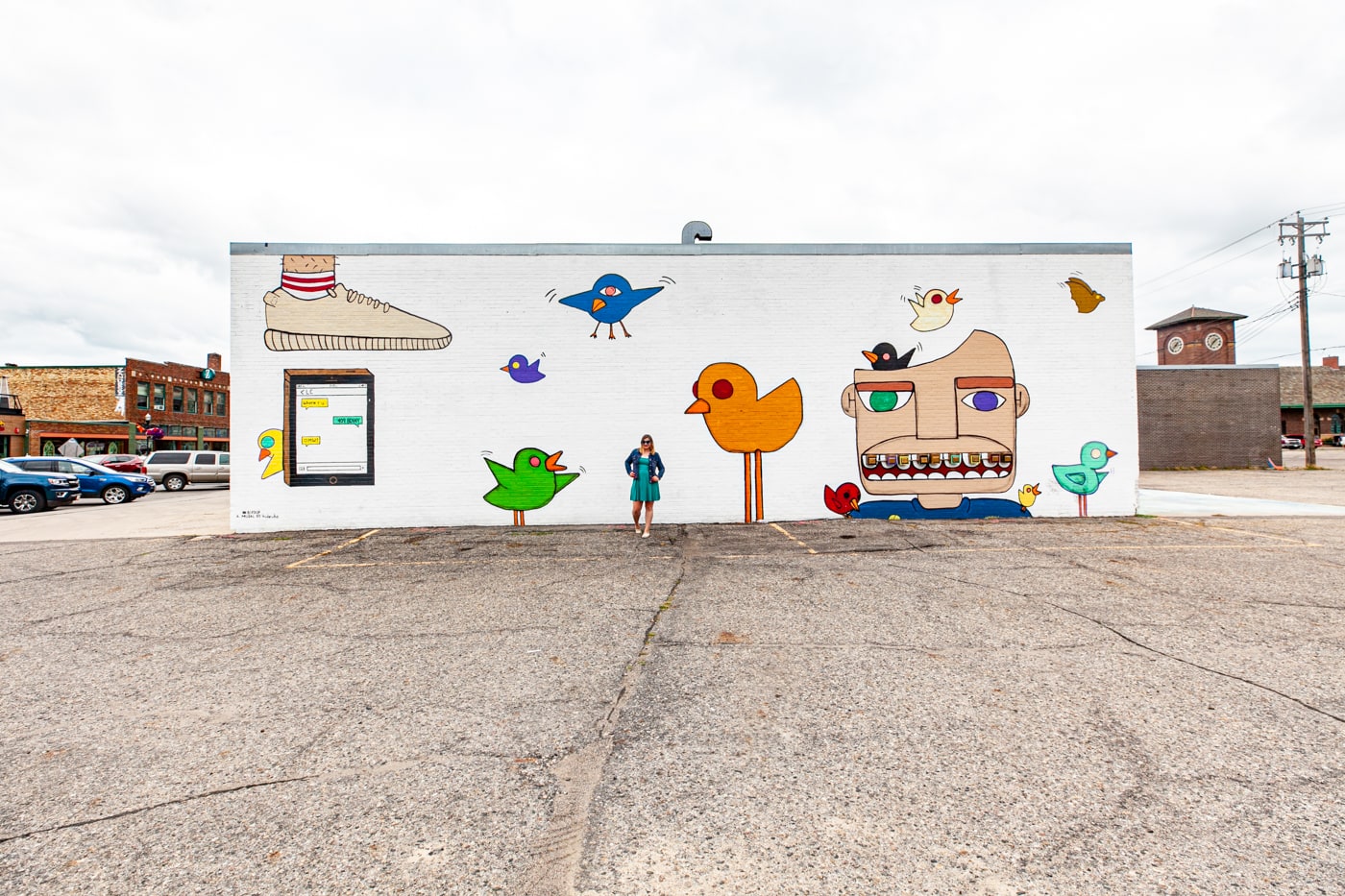 Bird Up Mural in Downtown Fargo, North Dakota by artist Hideuhs | Street Art in Fargo, North Dakota