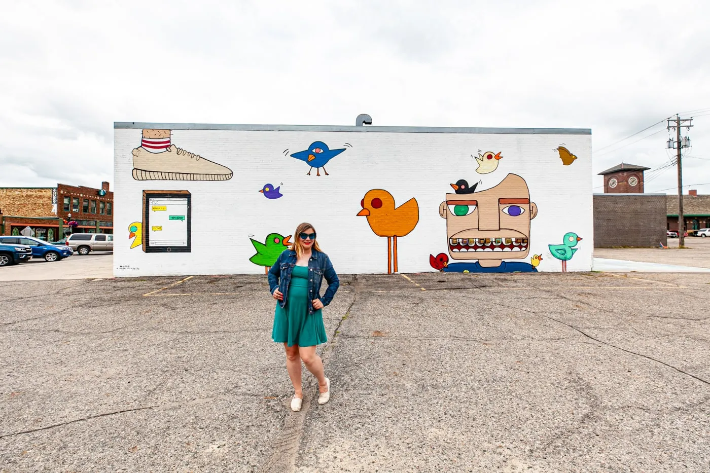 Bird Up Mural in Downtown Fargo, North Dakota by artist Hideuhs | Street Art in Fargo, North Dakota