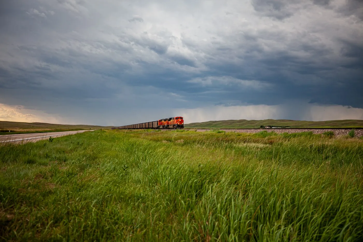 A train rides by the Nebraska Sandhills Journey Scenic Byway