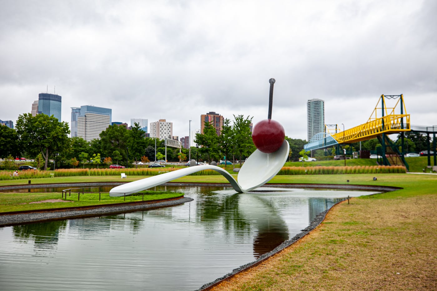 Spoonbridge and Cherry sculpture in Minneapolis, Minnesota | Giant Spoon and Cherry Roadside Attraction at Minneapolis Sculpture Garden in Minnesota