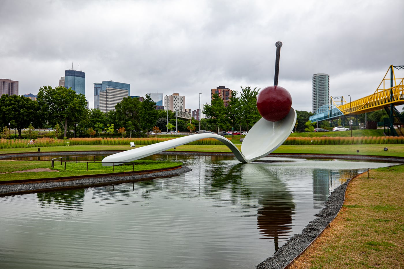 Spoonbridge and Cherry sculpture in Minneapolis, Minnesota | Giant Spoon and Cherry Roadside Attraction at Minneapolis Sculpture Garden in Minnesota