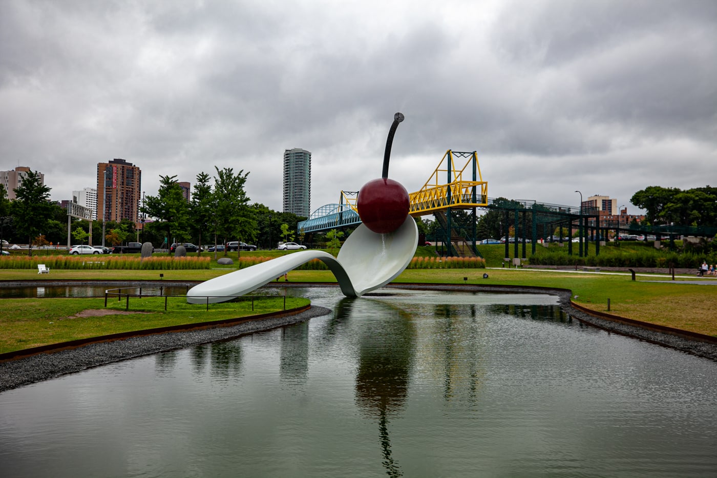 Spoonbridge and Cherry sculpture in Minneapolis, Minnesota | Giant Spoon and Cherry Roadside Attraction at Minneapolis Sculpture Garden in Minnesota