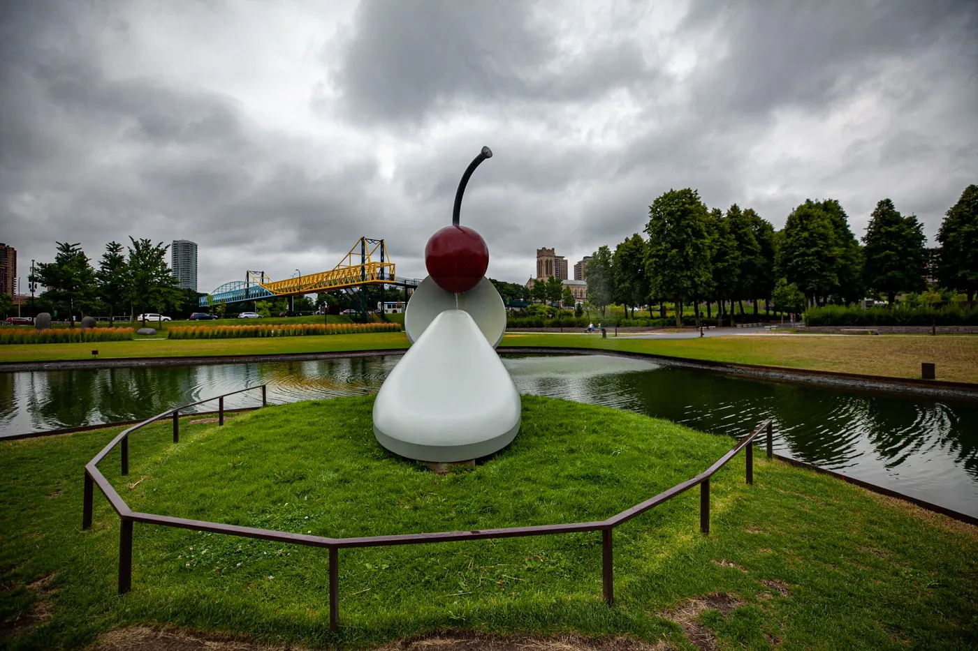 Spoonbridge and Cherry sculpture in Minneapolis, Minnesota | Giant Spoon and Cherry Roadside Attraction at Minneapolis Sculpture Garden in Minnesota
