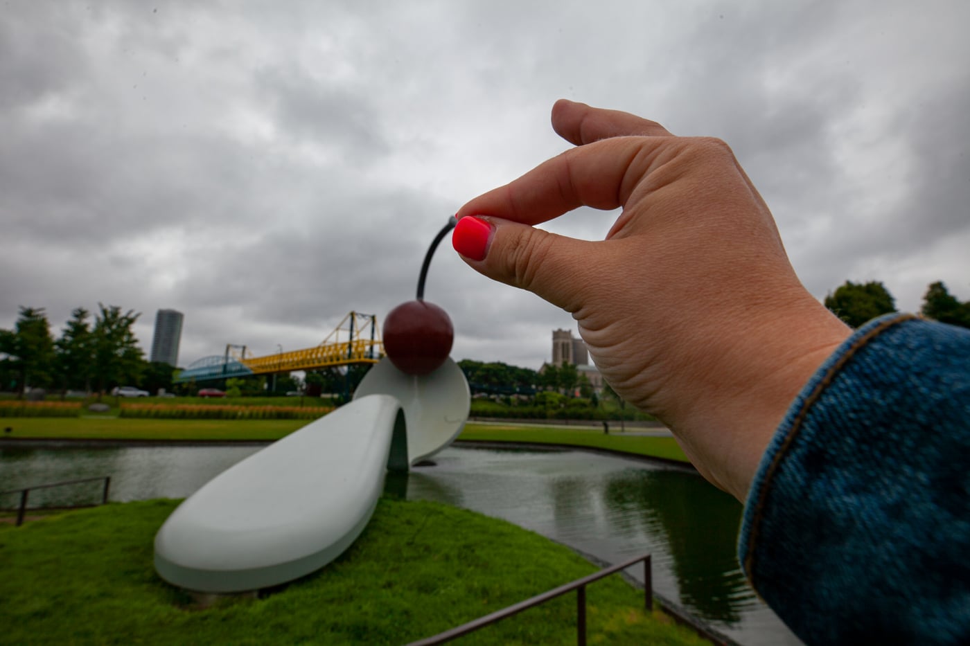 Spoonbridge and Cherry sculpture in Minneapolis, Minnesota | Giant Spoon and Cherry Roadside Attraction at Minneapolis Sculpture Garden in Minnesota