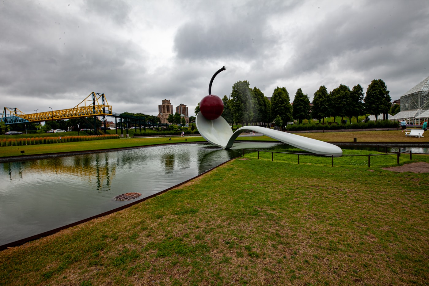 Spoonbridge and Cherry sculpture in Minneapolis, Minnesota | Giant Spoon and Cherry Roadside Attraction at Minneapolis Sculpture Garden in Minnesota