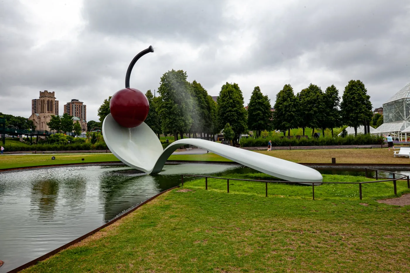 Spoonbridge and Cherry sculpture in Minneapolis, Minnesota | Giant Spoon and Cherry Roadside Attraction at Minneapolis Sculpture Garden in Minnesota
