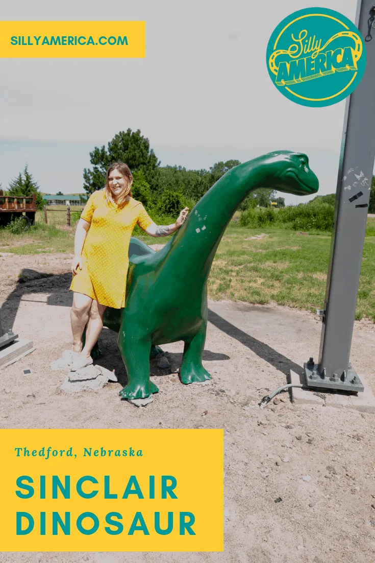 If you're taking a road trip and pass a Sinclair Gas Station it is required that you look for a dino. We found this Sinclair dinosaur in Thedford, Nebraska on the Sandhills Journey Scenic Byway. Visit this weird roadside attraction on a Nebraska road trip and add dino sightings to your travel bucket list and road trip itinerary.
#NebraskaRoadsideAttractions #NebraskaRoadsideAttraction #RoadsideAttractions #RoadTrip #NebraskaRoadTrip #ThingsToDoInNebraska #WeirdRoadsideAttractions #RoadTripStops