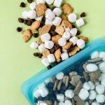 This s'mores snack mix recipe takes all the components of that camping staple we all know and love and puts it into an easy-to-eat-on-the-go package with teddy grahams, chocolate chips, marshmallows, and smoked sugar.