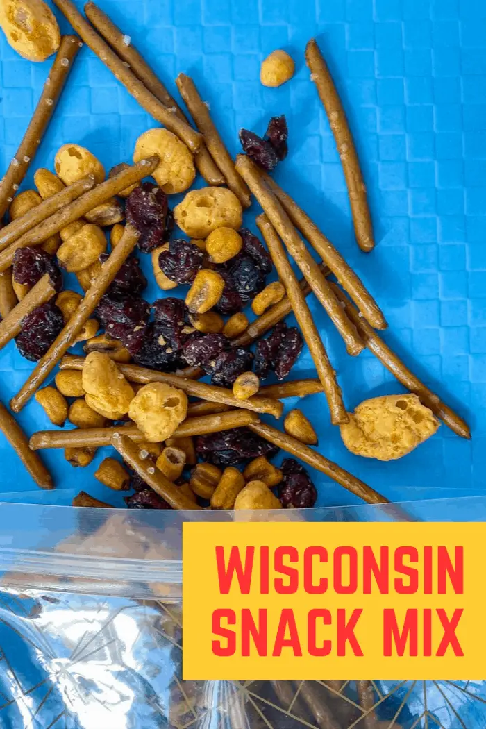 What are the best Wisconsin road trip snacks? We have them all plus the best Wisconsin recipe that snack mix combines all the flavors of the state. From cheese curds to pretzels to cranberries, this is what you should snack on in Wisconsin.