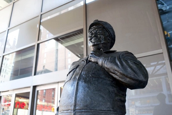 Ralph Kramden Statue of Jackie Gleason from the Honeymooners at the New York City Port Authority Bus Terminal - TV Land Landmarks: Statues of Classic Television Characters