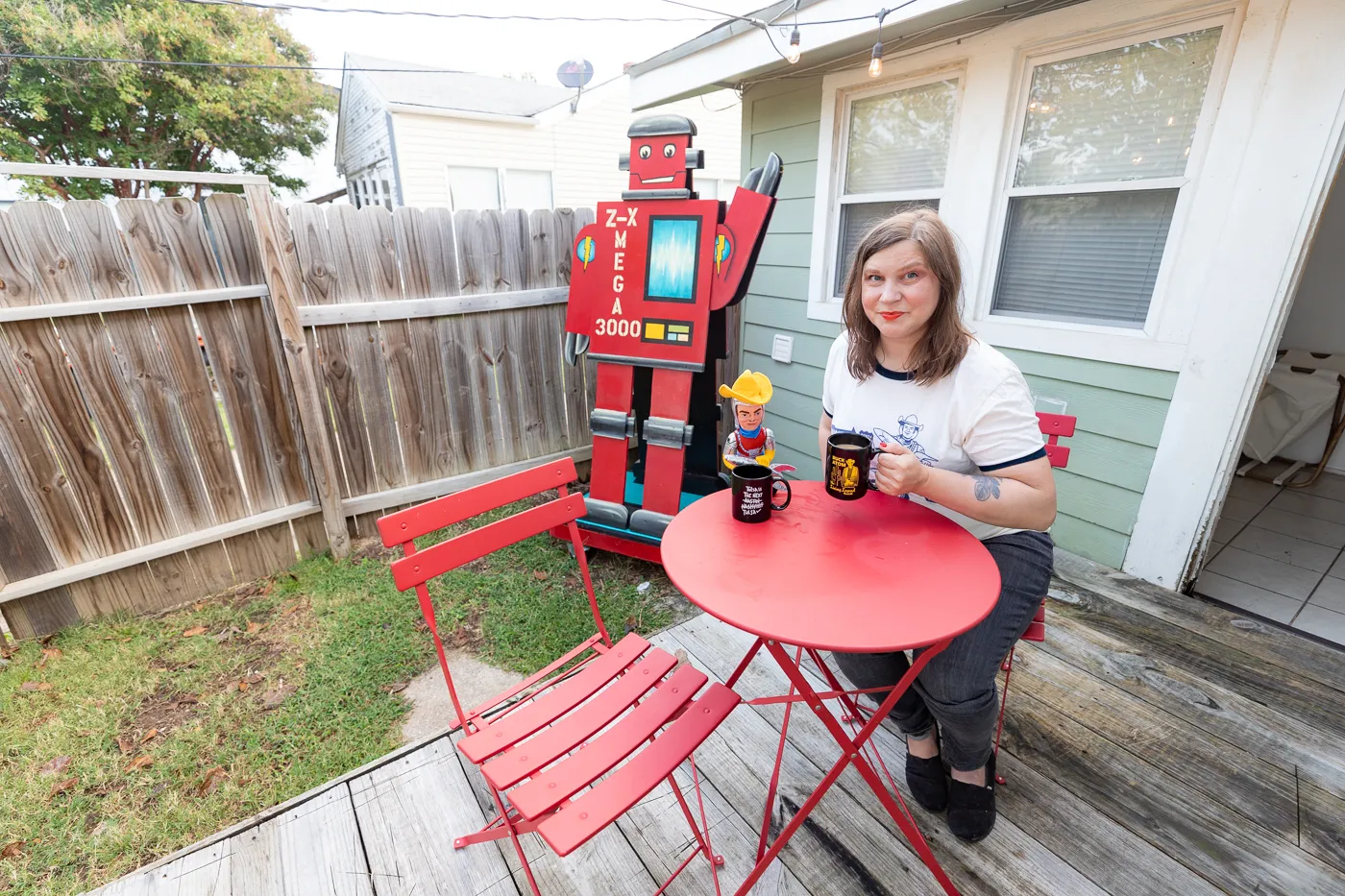 Coffee with a robot on the patio at Buck's Cosmic Crash Pad on Route 66 - Route 66 AirBNB in Tulsa, Oklahoma