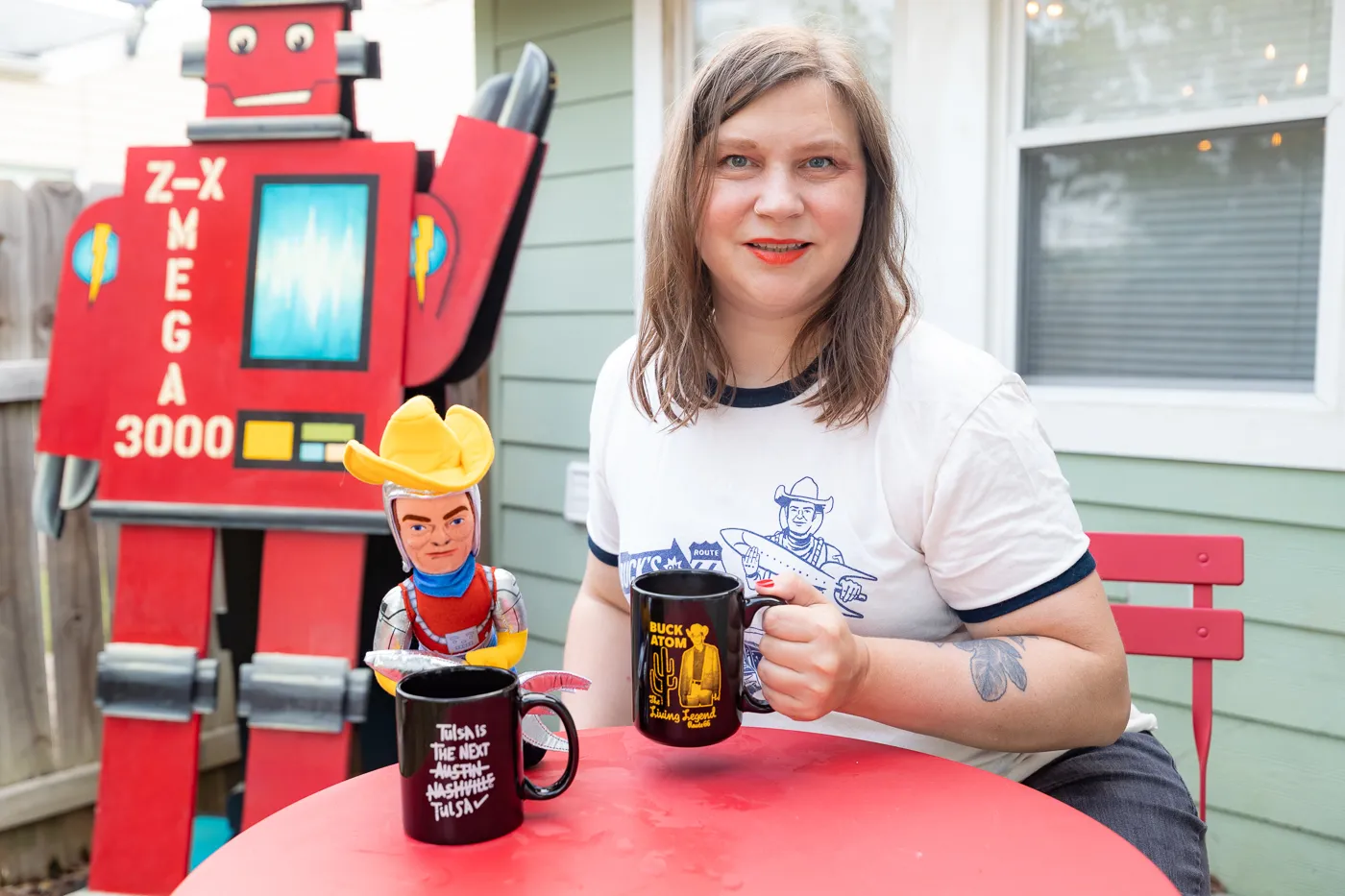 Coffee with a robot on the patio at Buck's Cosmic Crash Pad on Route 66 - Route 66 AirBNB in Tulsa, Oklahoma