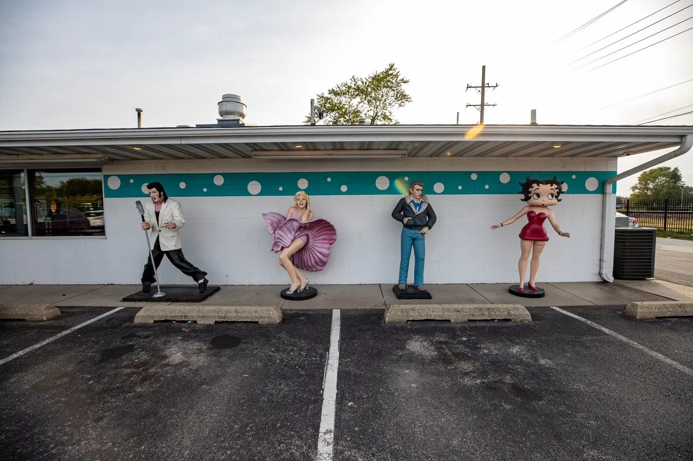 Statues of Elvis, Marilyn Monroe, James Dean, and Betty Boop at the Route 66 Polk-a-Dot Drive In in Braidwood, Illinois