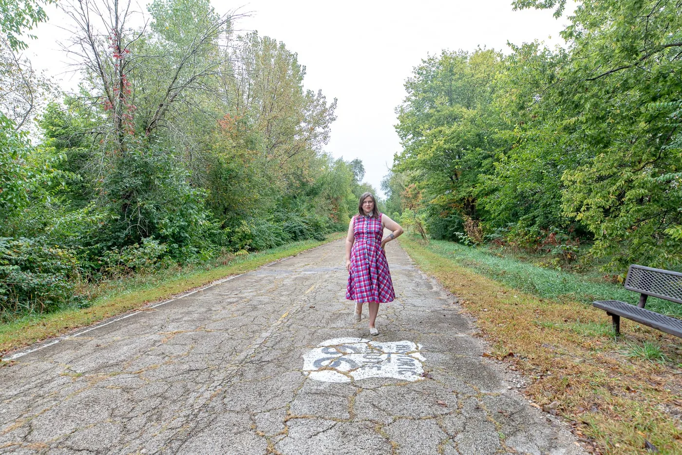 Walking on the original road at Route 66 Memory Lane in Lexington, Illinois