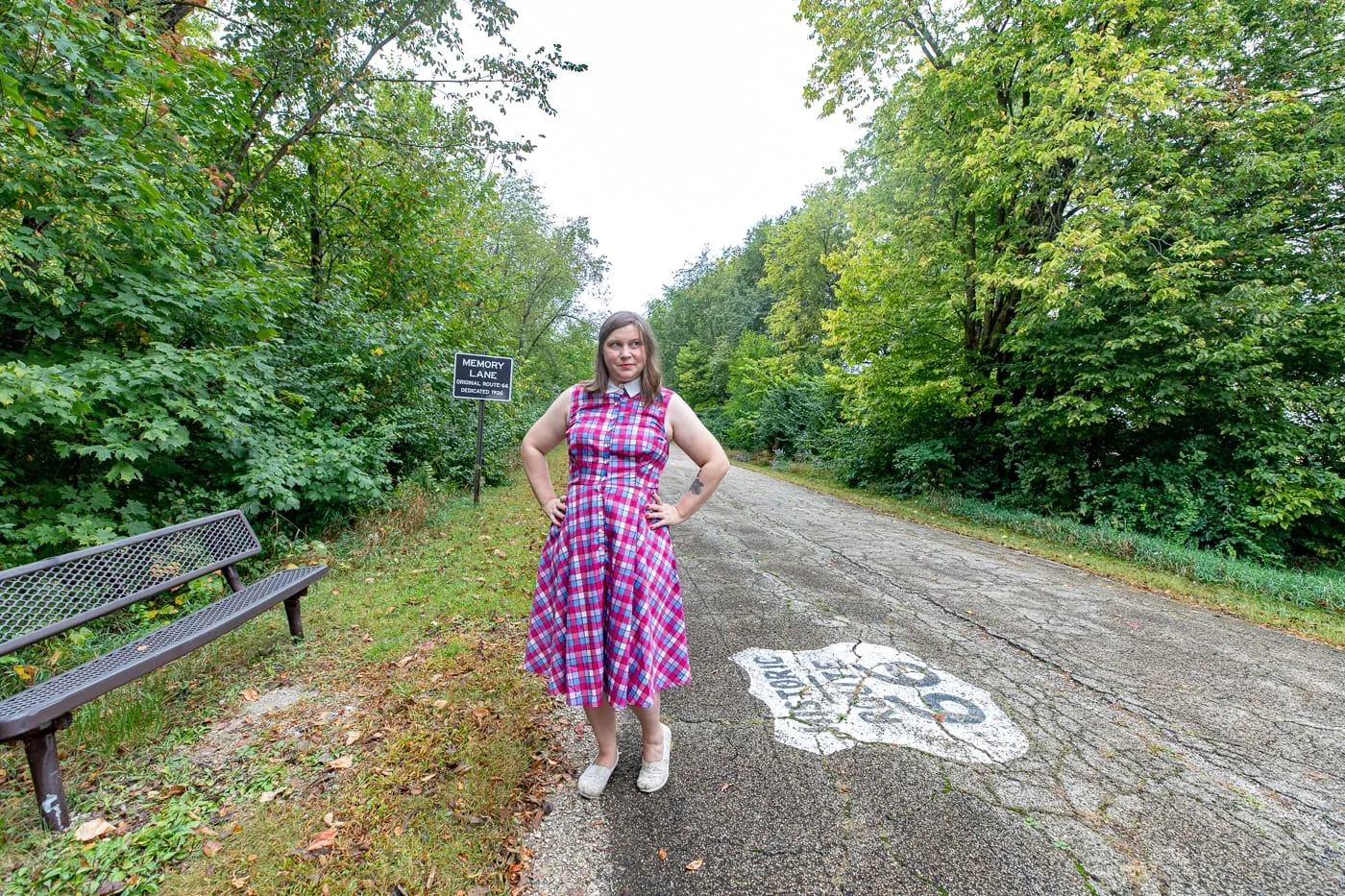 Walking on the original road at Route 66 Memory Lane in Lexington, Illinois