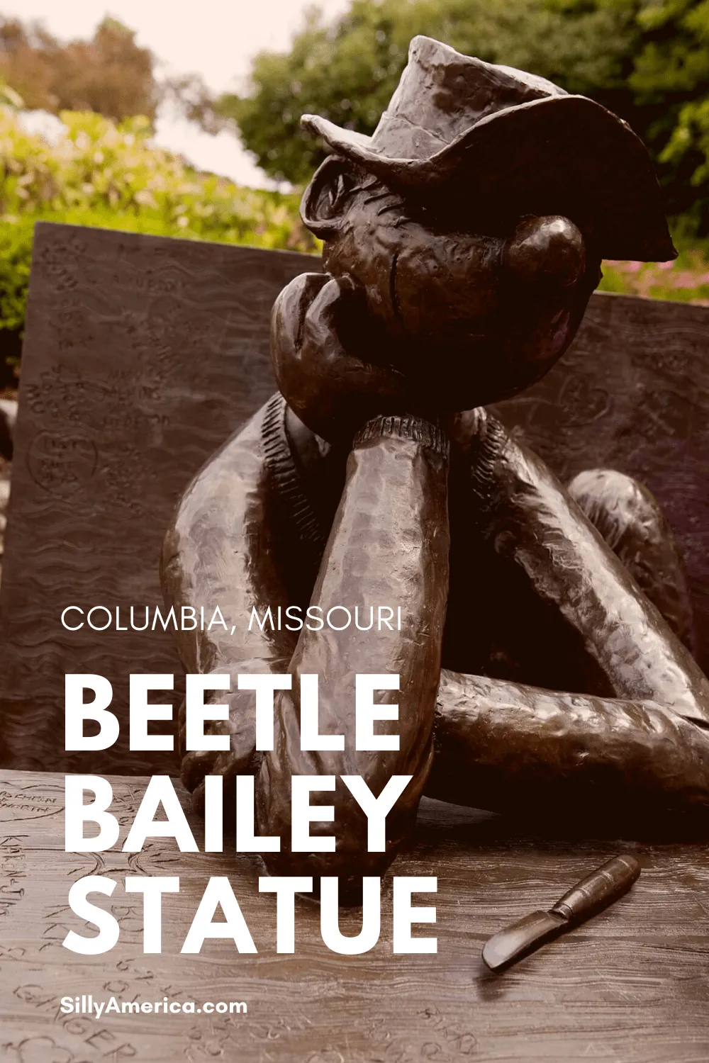 Celebrate comic strip artist and writer Mort Walker by visiting the Beetle Bailey Statue in Columbia, Missouri - a roadside attraction at the University of Missouri. #MissouriRoadsideAttractions #MissouriRoadsideAttraction #RoadsideAttractions #RoadsideAttraction #RoadTrip #MissouriRoadTrip #MissouriRoadTripMap #PlacestoVisitinMissouri #MissouriRoadTripIdeas #MissouriTravelRoadTrip #RoadsideAttraction #RoadsideAttractions