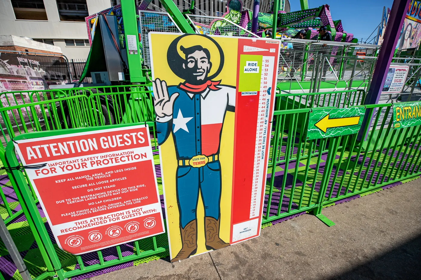Big Tex on a ride height sign.