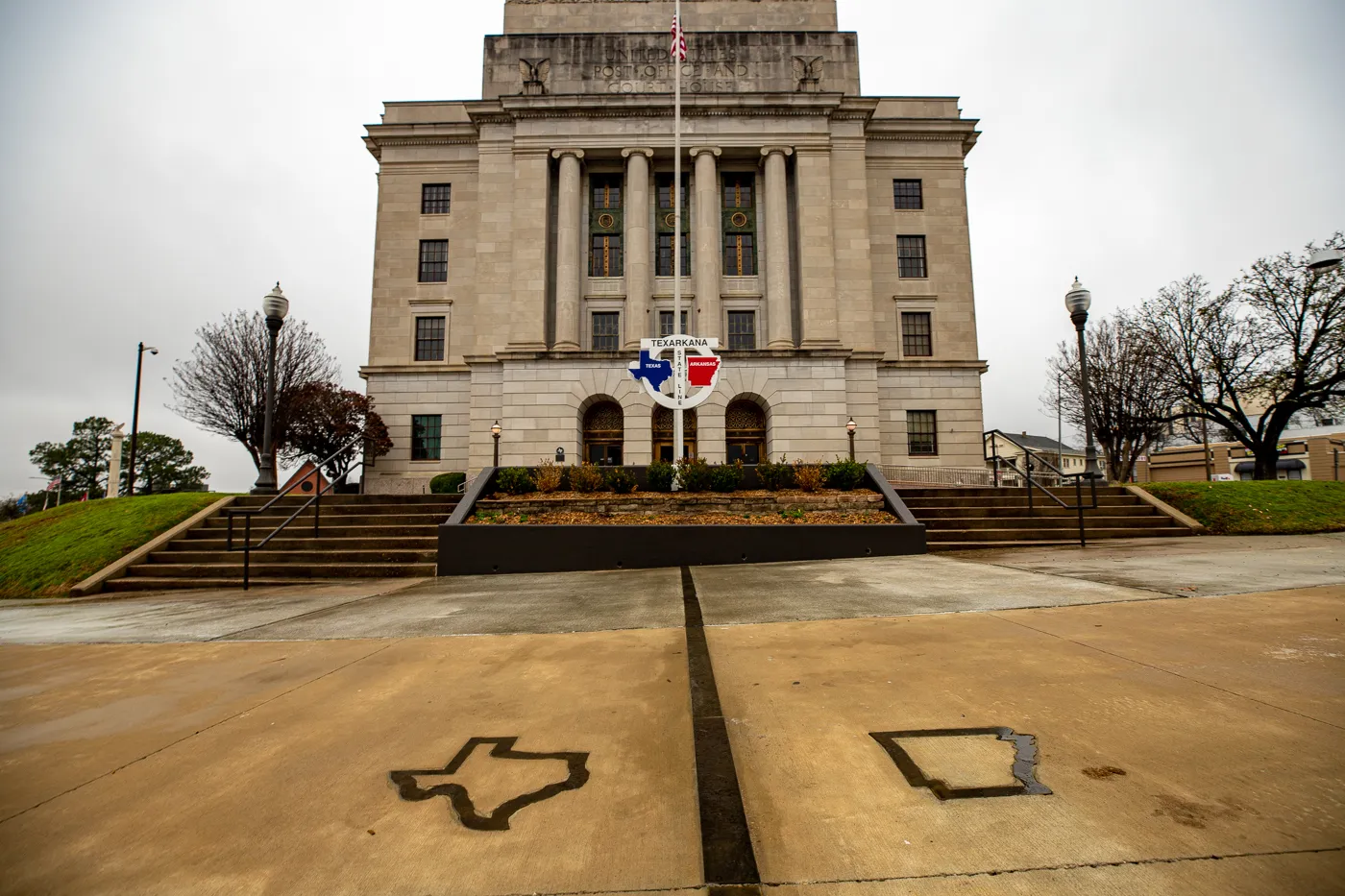 Texarkana State Line Sign at the post office that straddled the Texas and Arkansas borders