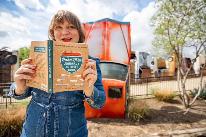 The Road Trip Journal & Activity Book - Reading a road trip book at The Truck Yard  in The Colony, Texas