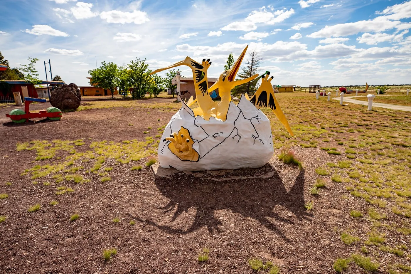 Hatching dinosaur egg at Flintstones Bedrock City in Williams, Arizona - Arizona Roadside Attraction