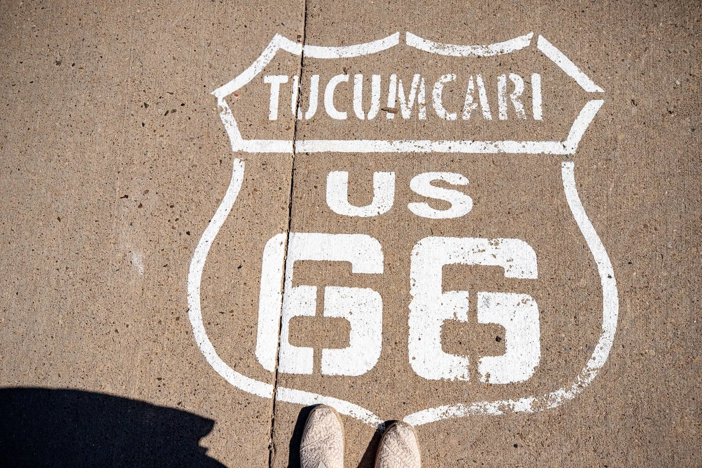 Tucumcari Route 66 shield on sidewalk at Motel Safari in Tucumcari, New Mexico (Route 66 Motel)