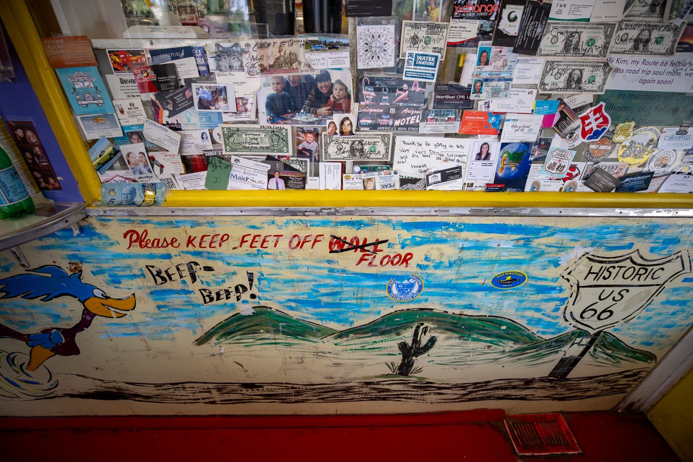 Walls covered with notes and money inside Delgadillo’s Snow Cap in Seligman, Arizona - Route 66 restaurant and Drive-In Diner