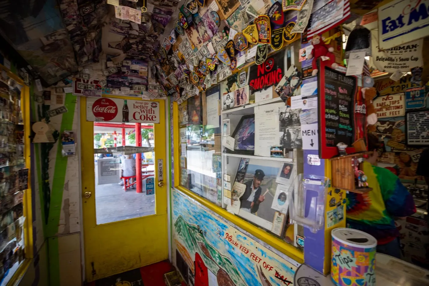 Walls covered with notes and money inside Delgadillo’s Snow Cap in Seligman, Arizona - Route 66 restaurant and Drive-In Diner