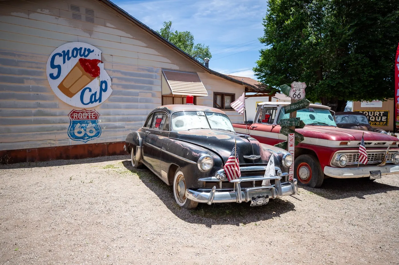 Vintage cars at Delgadillo’s Snow Cap in Seligman, Arizona - Route 66 restaurant and Drive-In Diner