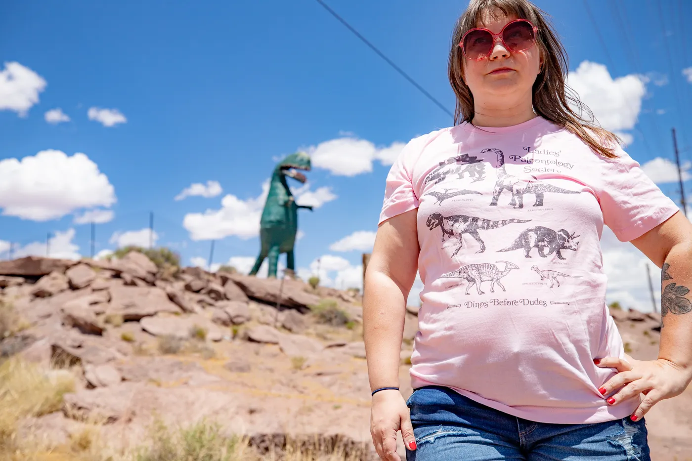 Giant dinosaur eating a woman at Stewart's Petrified Wood in Holbrook, Arizona Route 66 Roadside Attraction