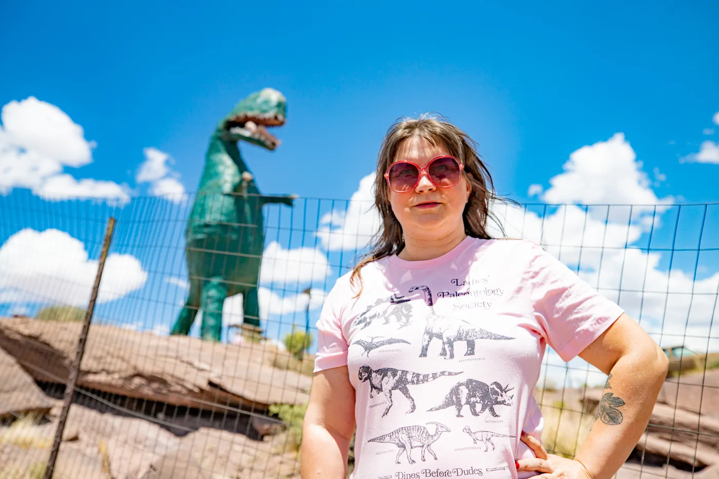 Giant dinosaur eating a woman at Stewart's Petrified Wood in Holbrook, Arizona Route 66 Roadside Attraction